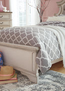 Realyn Upholstered Bed - 5th Ave Furniture