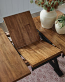 Wildenauer Counter Height Butterfly Extension Table - 5th Ave Furniture